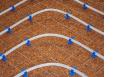 Raffrescamento a pavimento: il sistema radiante Cork con rete clips di Kloben